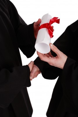 Diploma and Handshake